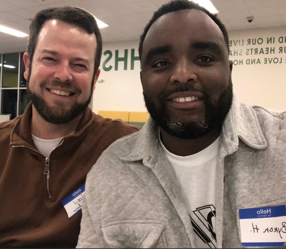 Byron Haynes with a fellow Fort Worth ISD task force member wearing name tags